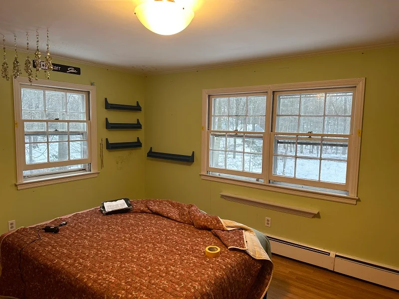 Wood single pane double hungs with storm windows